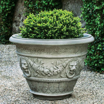 Campania International Rosecliff Planter is shown in the Alpine Stone Patina. Made from cast stone.