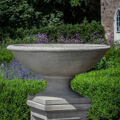 Campania International Beauport Urn is shown in the Alpine Stone Patina. Made from cast stone.
