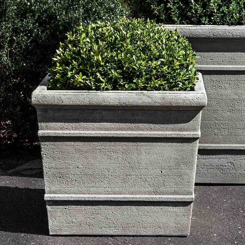 Campania International Marin Small Planter is shown in the Greystone Patina. Made from cast stone.