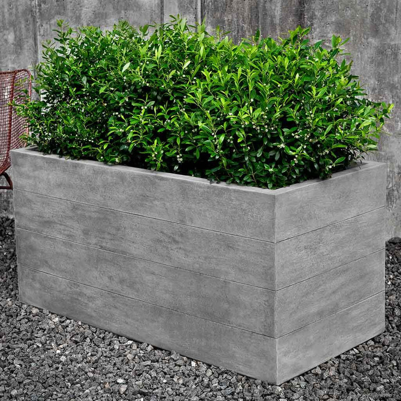 Campania International Chenes Brut Long Box Planter is shown in the Greystone Patina. Made from cast stone.
