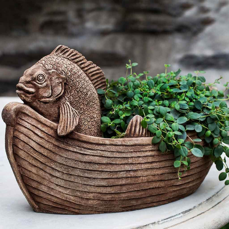 Campania International Fish Out of Water is shown in the Brownstone Patina. Made from cast stone.