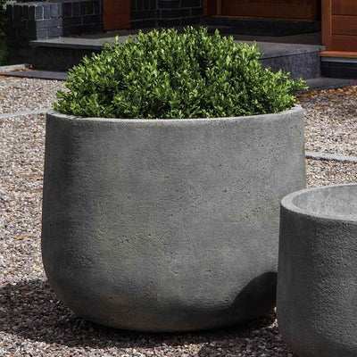 Campania International Tribeca Large Planter is shown in the Greystone Patina. Made from cast stone.