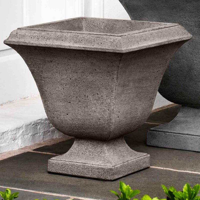 Campania International Trowbridge Small Urn is shown in the Greystone Patina. Made from cast stone.