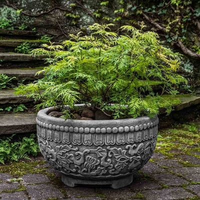 Campania International Jaipur Bowl is shown in the Alpine Stone Patina. Made from cast stone.