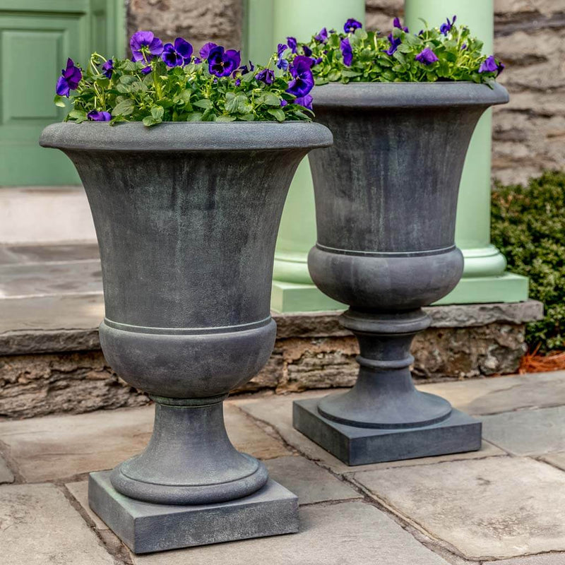 Campania International Soane Urn is shown in the Lead Antique Patina. Made from cast stone.