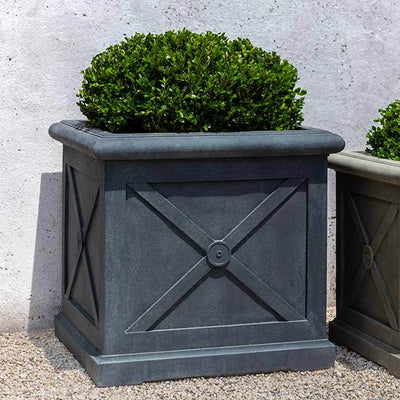 Campania International Montparnasse Large Planter is shown in the Aged Limestone Patina. Made from cast stone.