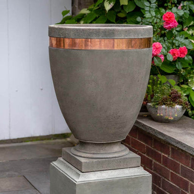 Campania International Moderne Tall Planter is shown in the Alpine Stone Patina. Made from cast stone.