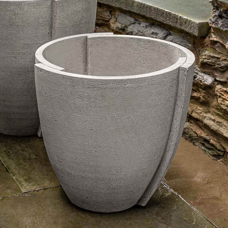 Campania International Concept Medium Planter is patio perfection ready for soft foliage and shown in the Greystone Patina. Made from cast stone.