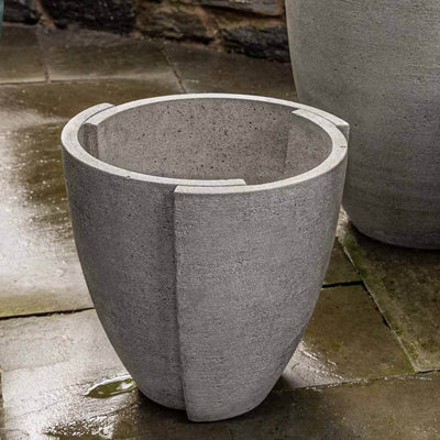 Campania International Concept Small Planter is patio perfection ready for soft foliage and shown in the Greystone Patina. Made from cast stone.