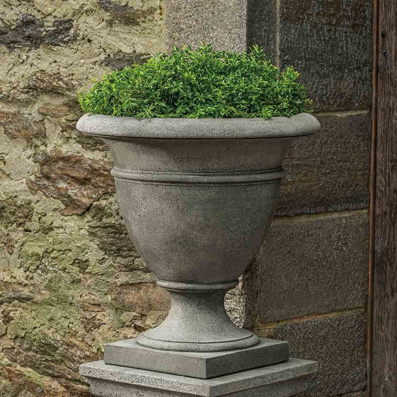 Campania International Rustic St. James Large Urn is shown in the Alpine Stone Patina. Made from cast stone.