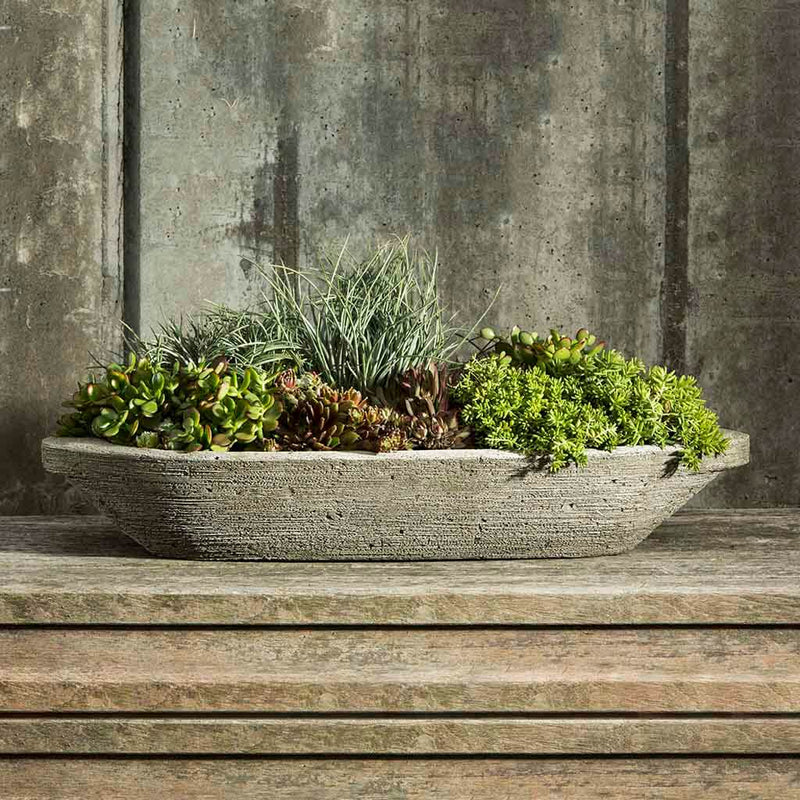 Campania International Barca Planter is shown in the Alpine Stone Patina. Made from cast stone.