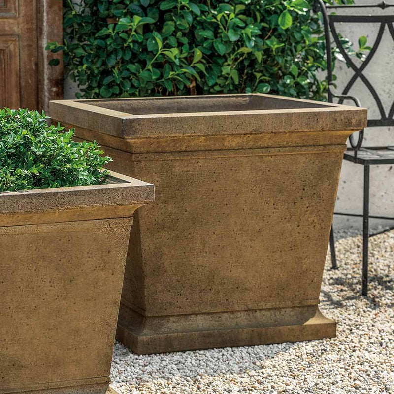 Campania International Madison Large Planter, ready for plants , ideal for entryways or patios, shown in the Aged Limestone Patina. Made from cast stone.