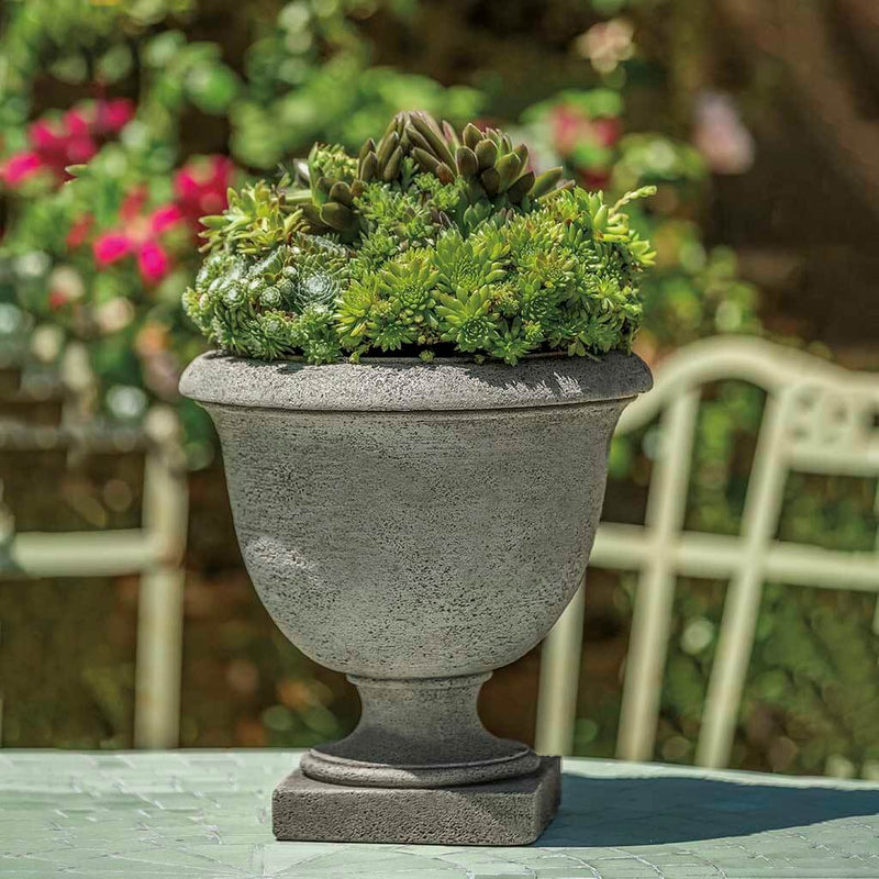 Campania International Brookhaven Urn is shown in the Alpine Stone Patina. Made from cast stone.