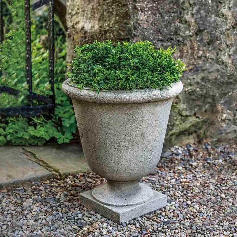 Campania International Hampton Terrace Urn is shown in the Alpine Stone Patina. Made from cast stone.