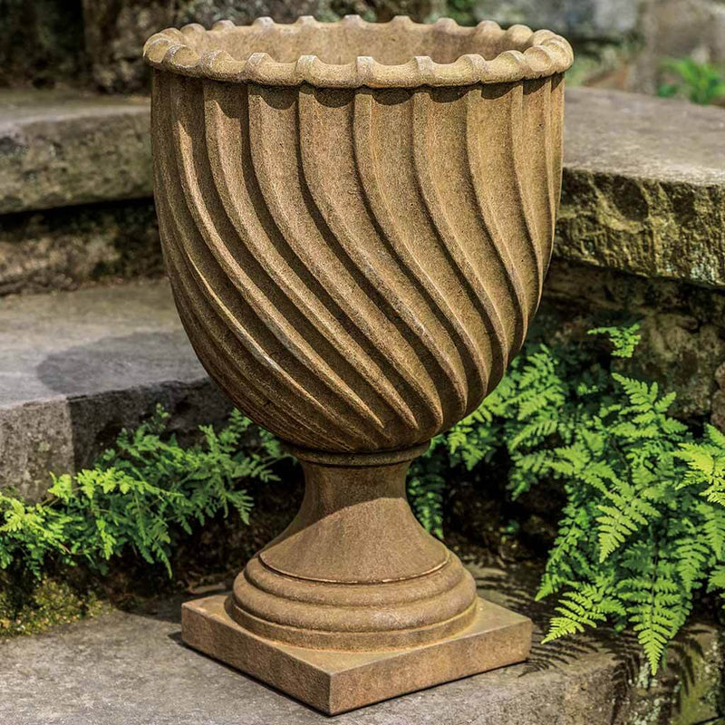 Campania International Ravenna Small Urn is shown in the Age Limestone Patina. Made from cast stone.