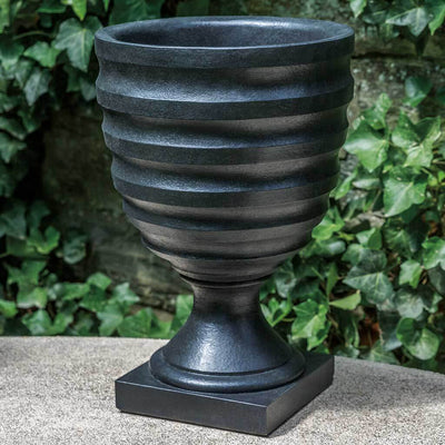 Campania International Cold Spring Urn is shown in the Nero Nuovo Patina. Made from cast stone.