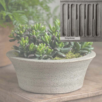 Greystone Patina for the Campania International Bulb Planter , a classic gray, soft, and muted, blends nicely in the garden.