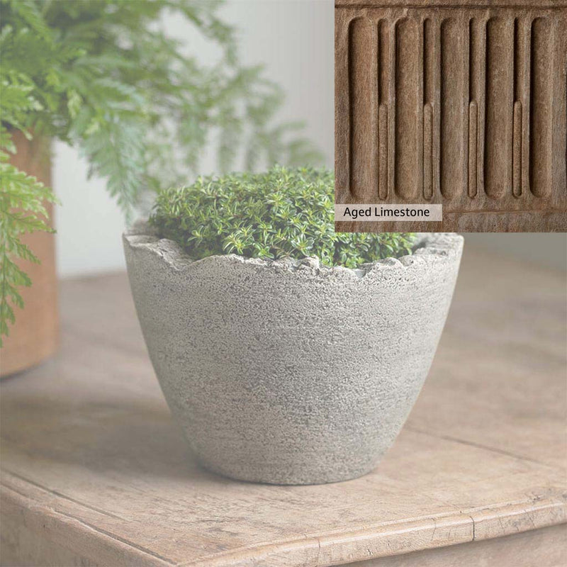 Aged Limestone Patina for the Campania International Mini Broken Egg Planter, brown, orange, and green for an old stone look.