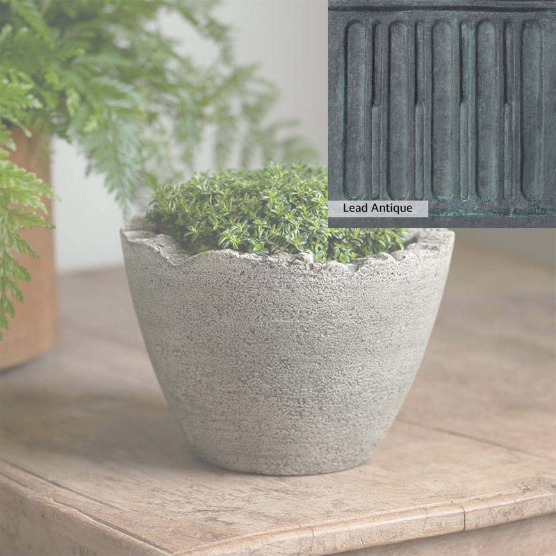 The Lead Antique Patina for the Campania International Mini Broken Egg Planter, aged blue and grey layered to give the look of a classic antique lead patina.