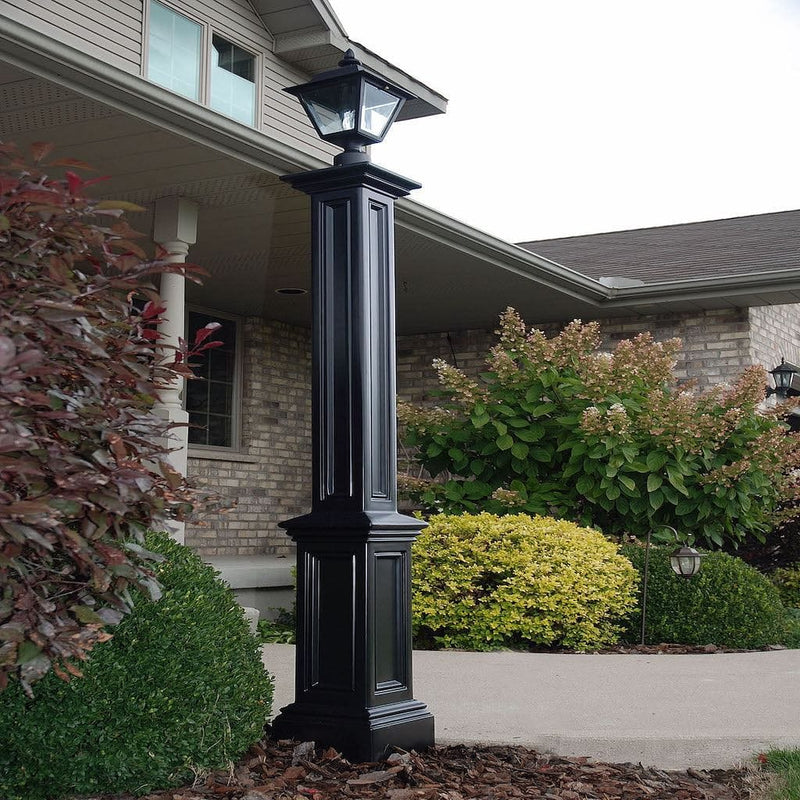 The Mayne Signature Lamp Post with no mount, in the black finish, installed for curb appeal.