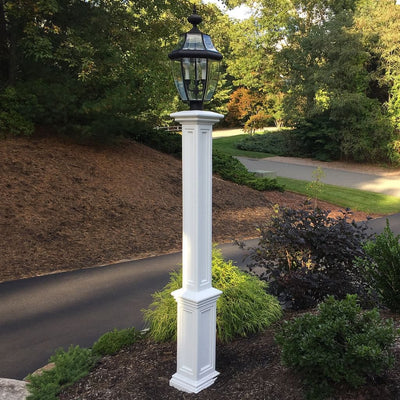 The Mayne Signature Lamp Post with no mount, in the white finish, installed for curb appeal.