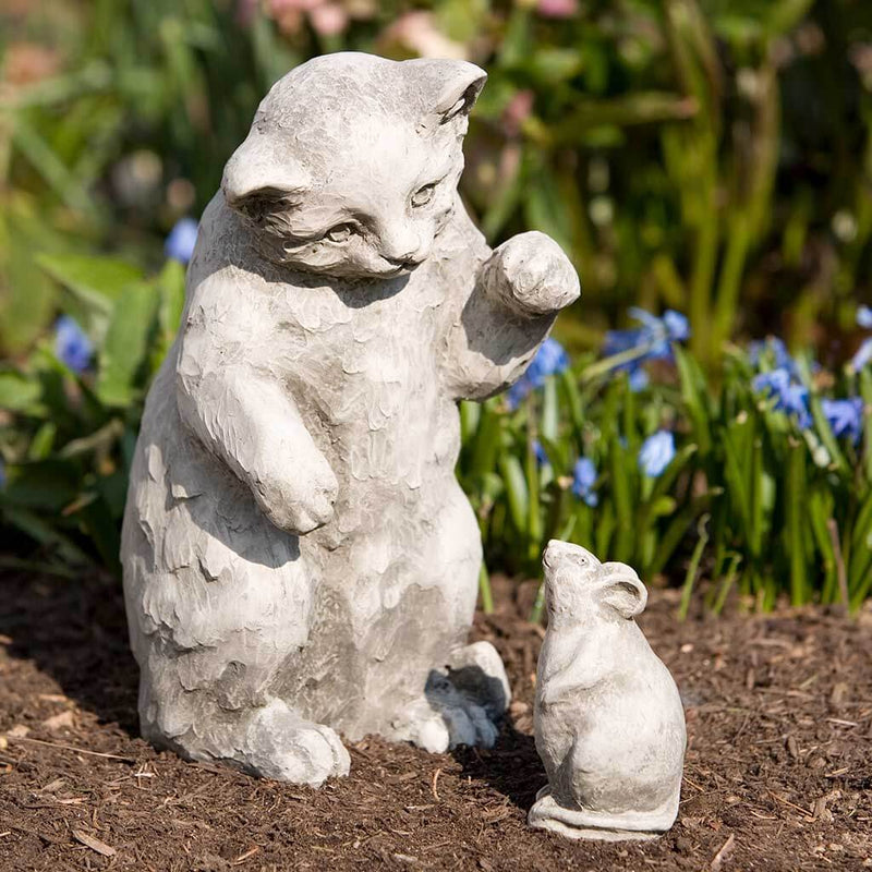 Campania International Playful Kitten Statue, set in the garden to add charm and character. The statue is shown in the Greystone Patina.