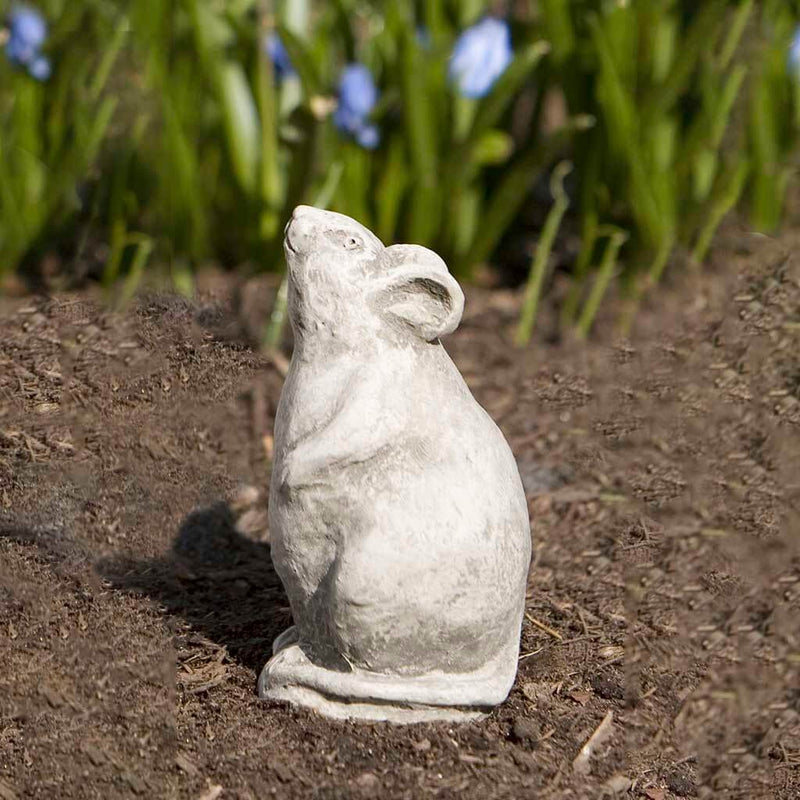 Campania International Mousie Mouse Statue, set in the garden to add charm and character. The statue is shown in the Greystone Patina.