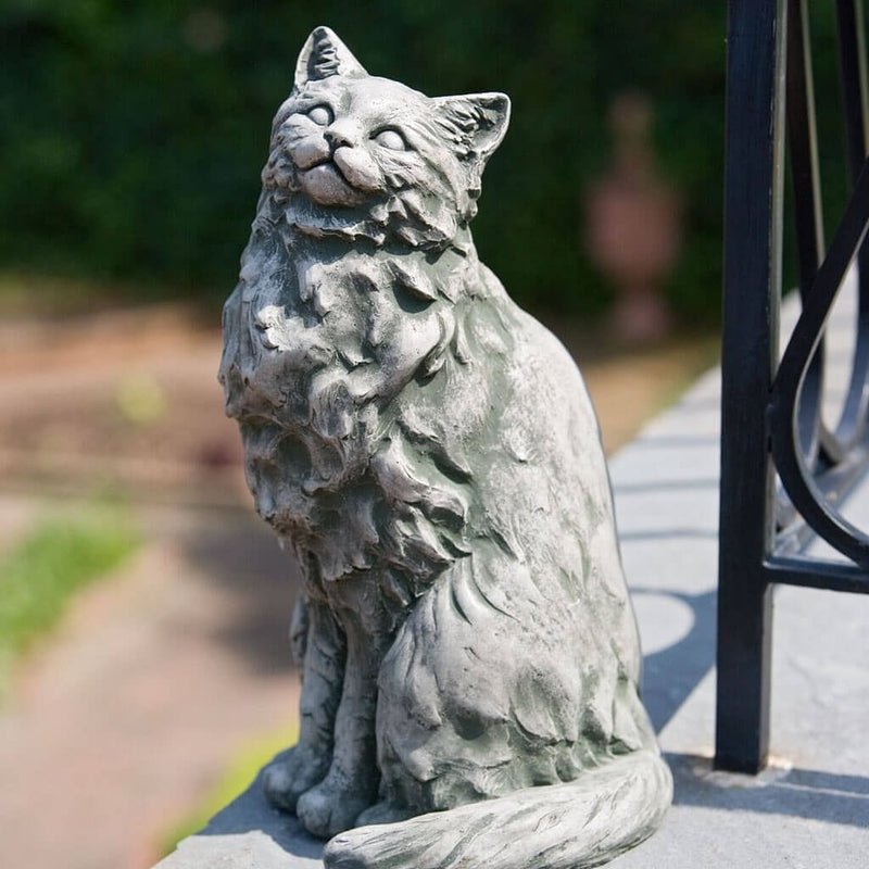 Campania International Tanner the Cat Statue, set in the garden to add charm and character. The statue is shown in the Alpine Stone Patina.