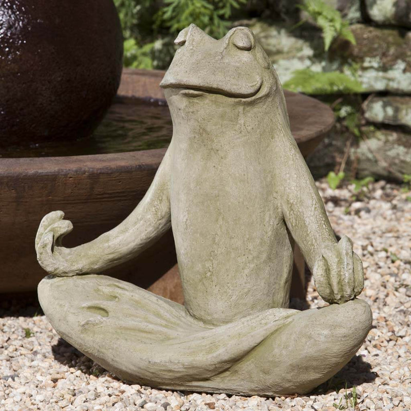 Campania International - Totally Zen Frog Statue , set in the garden to add charm and character. The statue is shown in the English Moss Patina.