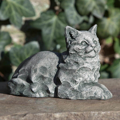 Campania International Cleo Cat Garden Statue, set in the garden to add charm and character. The statue is shown in the Alpine Stone Patina.