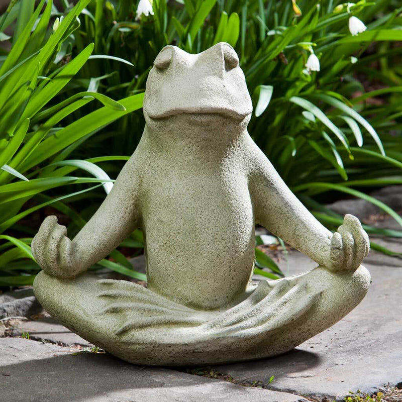 Campania International Totally Zen Too Frog Statue , set in the garden to add charm and character. The statue is shown in the English Moss Patina.