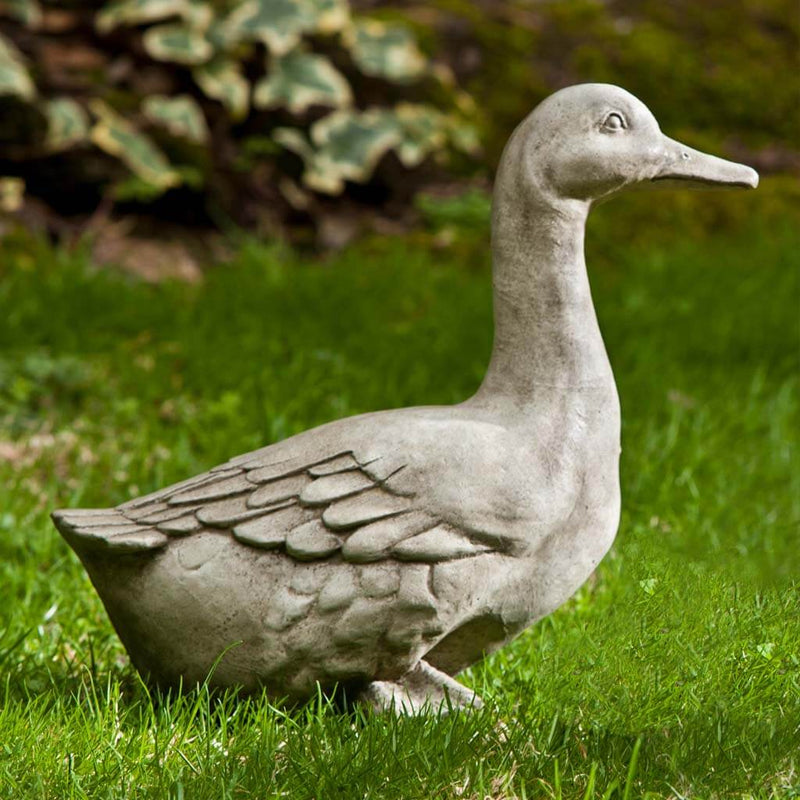 Campania International Quackers Goose Garden Statue stained in the Verde  patina, the ideal color for this garden statue.