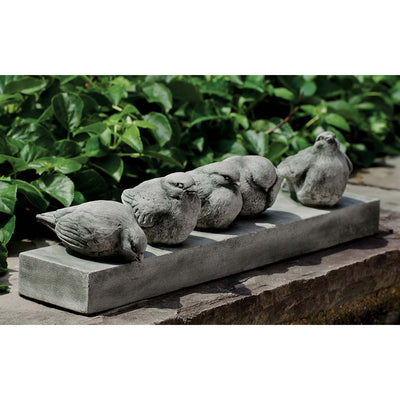 Campania International Happy Hour Birds Garden Statue , set in the garden to add charm and character. The statue is shown in the Alpine Stone Patina.