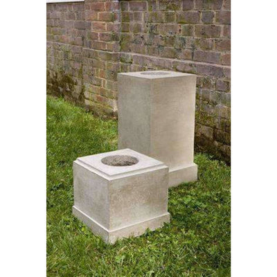 Campania International Classic Tall Pedestal, set in the garden elevate a statue or planter. The pedestal is 