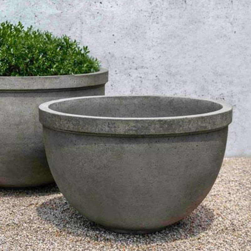 Campania International Huntington Large Bowl is shown in the Alpine Stone Patina. Made from cast stone.