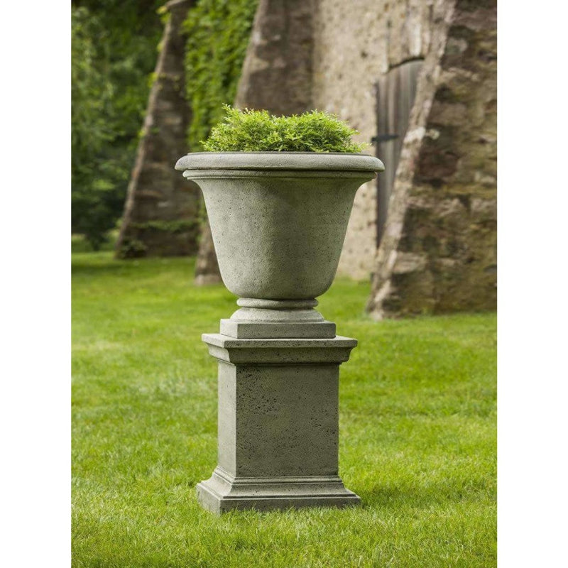 Campania International Rustic Hampton Urn with Pedestal is shown in the Alpine Stone Patina. Made from cast stone.