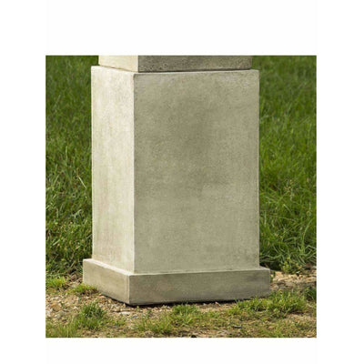 Campania International Savoy Pedestal, shown in hand-painted Verde, a light green-gray patina that works well against multiple colors in the landscape.