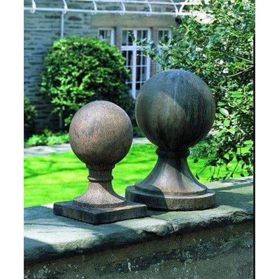 Campania International Small Sphere with Square Base stained in the Aged Limestone patina, the ideal color for this garden statue.