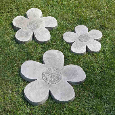Campania International Flower Power Stepping Stone Set stained in the Alpine Stone patina, the ideal color for this garden statue.