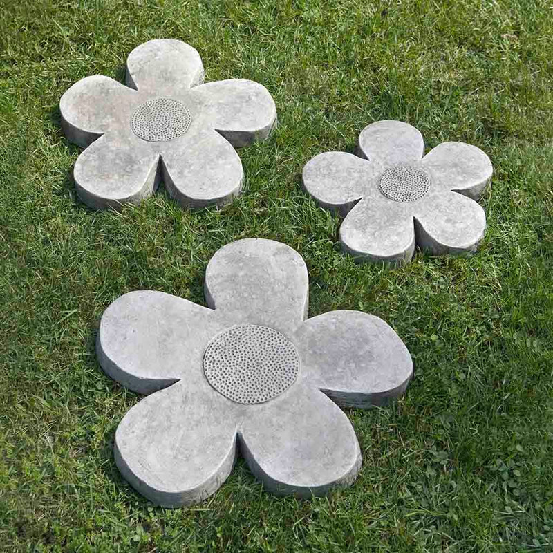 Campania International Flower Power Stepping Stone Set stained in the Alpine Stone patina, the ideal color for this garden statue.