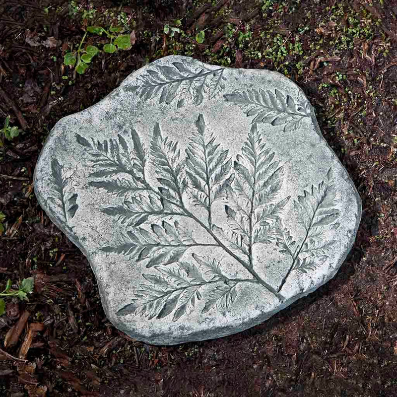 Campania International Fossil Fern Stepping Stone stained in the Alpine Stone patina, the ideal color for this garden statue.