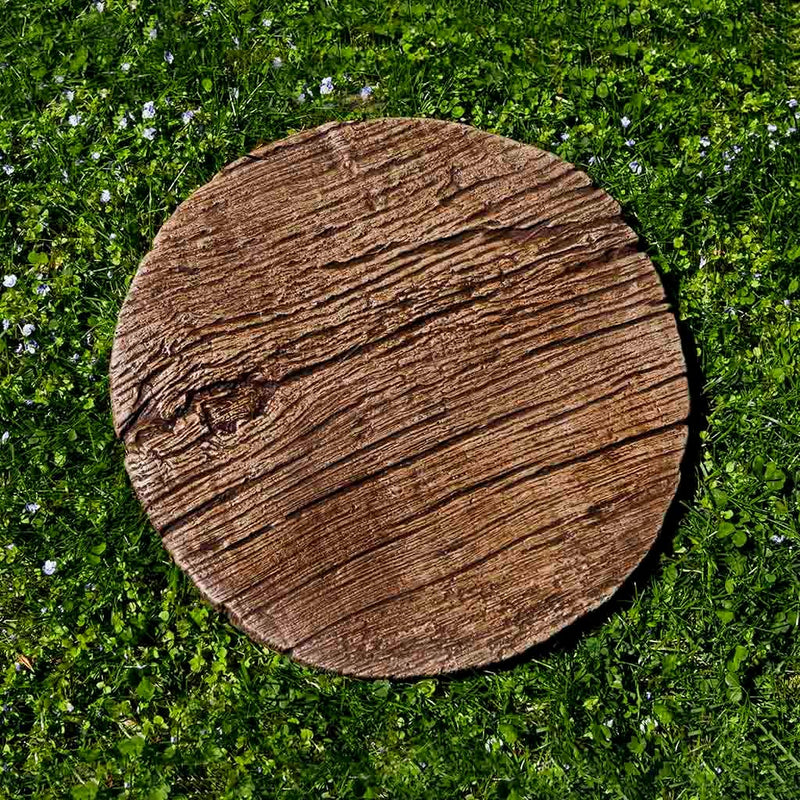 Campania International Faux Bois Stepping Stone stained in the Brownstone patina, the ideal color for this garden statue.