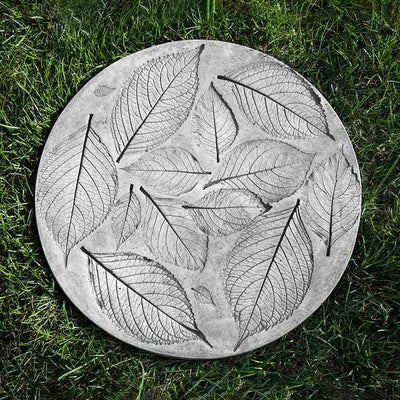 Campania International Hydrangea Leaf Stepping Stone stained in the Alpine Stone patina, the ideal color for this garden statue.