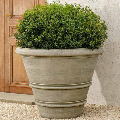 Campania International Classic Rolled Rim 40 inch a big planter that makes a timeless statement, shown in the Alpine Stone Patina. Made from cast stone.