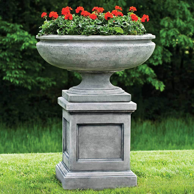 Campania International St Louis Urn on St Louis Pedestal is shown in the Alpine Stone Patina. Made from cast stone.