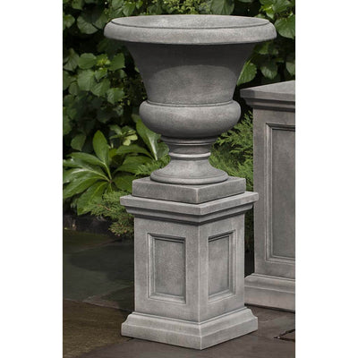 Campania International Mt. Airy Urn and Lenox Pedestal is shown in the Alpine Stone Patina. Made from cast stone.