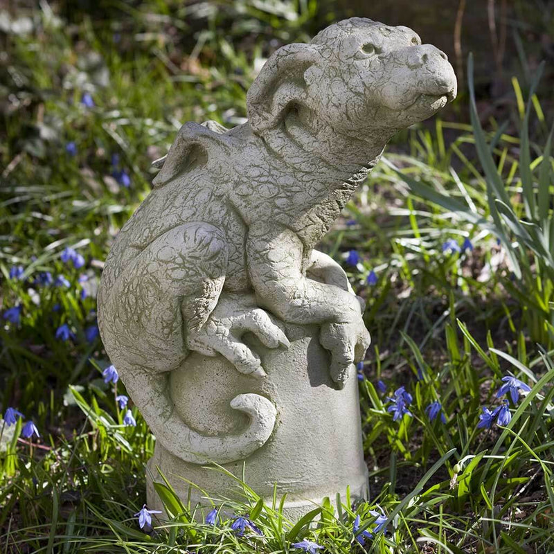Campania International Puddles Statue, set in the garden to add charm and character. The statue is shown in the English Moss Patina.