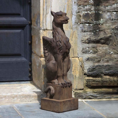 Campania International Gryphon Statue stained in the Pietra Nuova patina, the ideal color for this garden statue.
