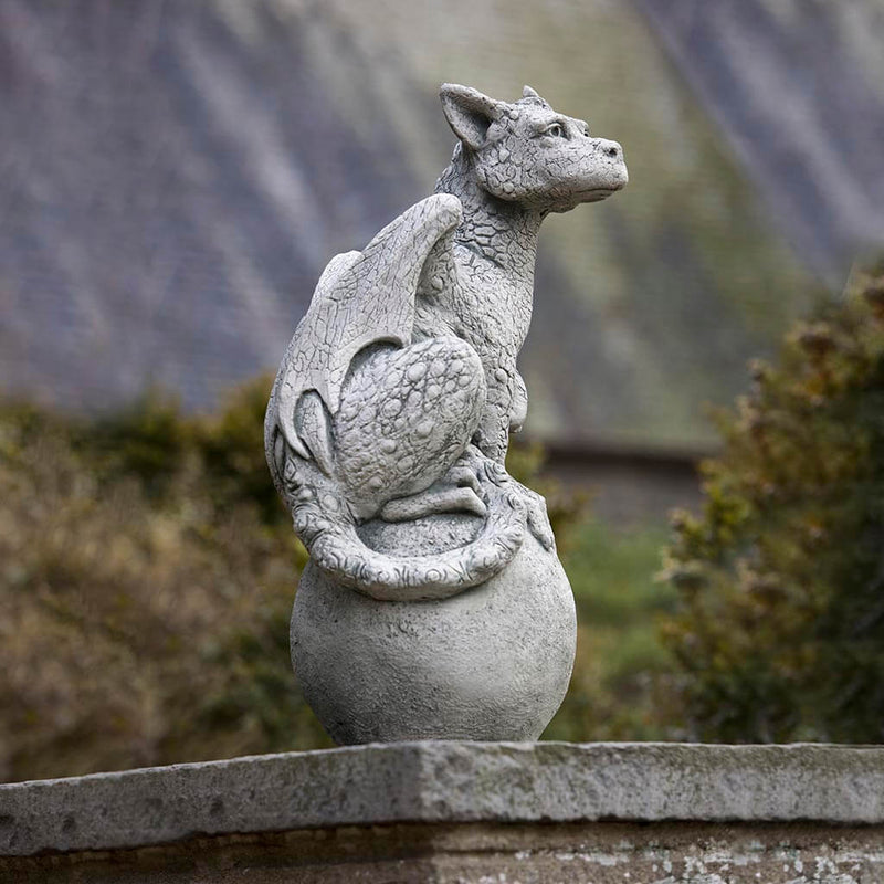 Campania International Eryl Statue, set in the garden to add charm and character. The statue is shown in the Alpine Stone Patina.