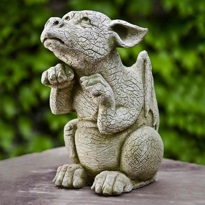 Campania International Scraps Statue stained in the English Moss patina, the ideal color for this garden statue.